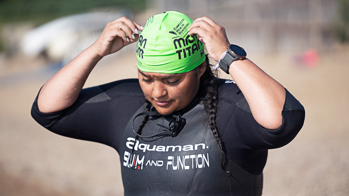 Woman Readying To Do A Training Swim A Woman In A Wetsuit Preparing To Do An Open Water Training Swim