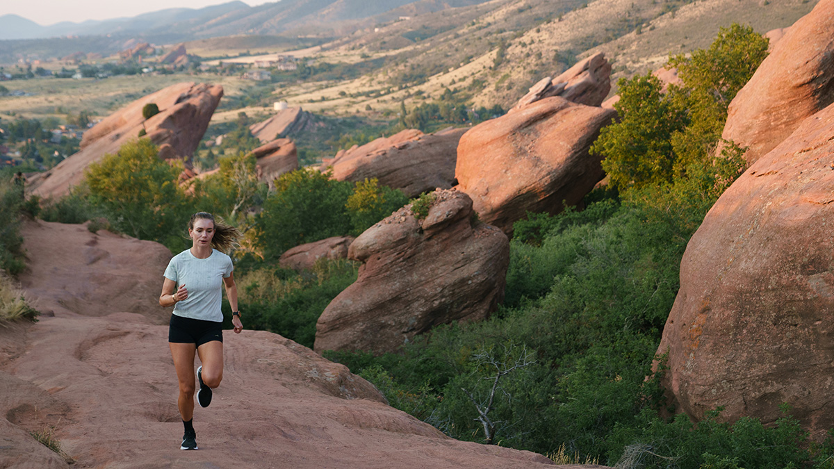Woman Running On Trail Woman Running On Trail