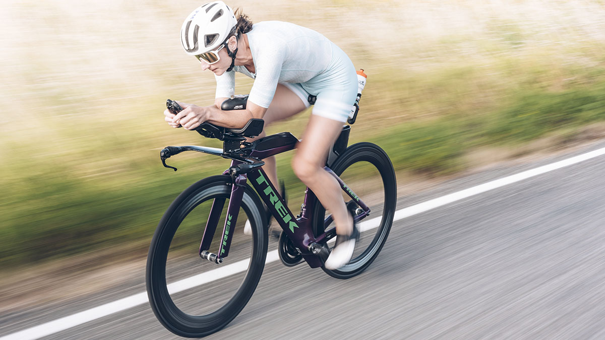 A Woman Training On Her Tt Bike For An Ironman Triathlon Race